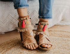 These Boho Sandals ankle belts will help you to completely transform any basic sandal into something stylish and unique. They are made with carefully selected ethnic materials, in a completely handmade process. With them, you will get those sandals that you wear everywhere and have super comfortable, have a different air when you want. In this way, you can enhance that Boho-Chic style that we love so much. This ad is for a pair of anklets, footwear is not included. If you need a custom design or for a girl, do not hesitate to write to me and we will design it together. The anklets are adjustable to fit a variety of widths. Handmade design Made with old trimmings from India, there are only 5 units available Adjustable leather straps Measurements for decorative part of the anklet are approx: Closed Toe Sandals For Summer Festivals, Ankle Strap Barefoot Sandals For Beach Vacation, Summer Festival Sandals With Single Toe Strap, Bohemian Round Toe Sandals For Spring, Summer Beach Anklet With Ankle Wrap, Bohemian Flat Heel Sandals For Vacation, Summer Beach Anklets With Ankle Strap, Summer Barefoot Sandals With Ankle Strap, Summer Vacation Barefoot Sandals With Ankle Strap