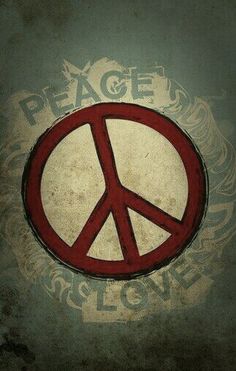 a peace sign painted on the side of a wall with words above it that read, peace is love