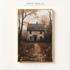 an old house in the fall with leaves on the ground and trees around it,