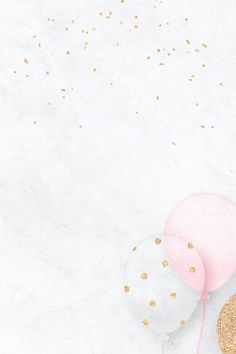 two balloons with pink and gold confetti on white marble background, top view