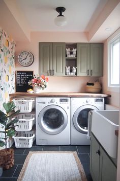 an advertisement for a washer and dryer in a kitchen with flowers on the counter