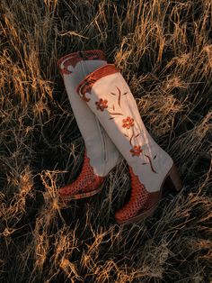 WE OFFER FREE SHIPPING on our website www.dandelie.com Please follow @dandeliethelabel on Instagram for updates These flower boots in orange are handcrafted in Spain. Our boots are made of the finest leather, and over time will adjust and mould to fit your feet perfectly. Our boots compliment any style, whether you're a 70s vintage babe, a Bohemian soul, a Western cowgirl, or just looking to spice up your style! These boots are a statement, investment piece that will elevate any outfit. Measurem Western Boots Outfit, Flower Boots, Boots Long, Bohemian Soul, Popular Boots, Floral Boots, Cowgirl Aesthetic, Cow Girl, Dream Shoes