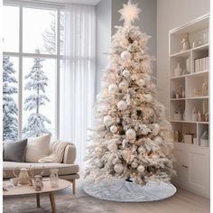 a white christmas tree in a living room