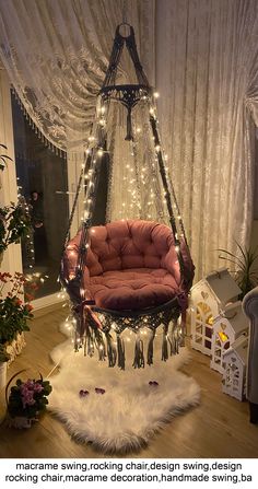 a hanging chair with lights on it in a room