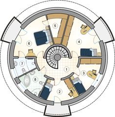 the floor plan for a round house with living room and kitchen areas, including a dining area