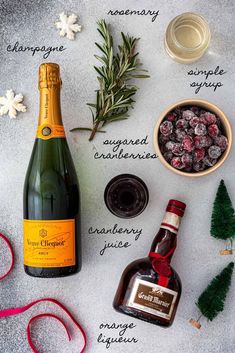 the ingredients to make this holiday drink include cranberries, rosemary, ginger syrup, and champagne