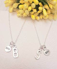 It's more than charm, it's a besties necklace set!  This exquisite 18" snake chain necklaces comes with two best friend necklaces and initial charms. This custom necklaces also comes with a silver letter initial charm that can be customized according to your choice. Product Details: Material: silver necklace. Chain Length: 18 Inches (Can be made in different lengths) Charms: best friend charms and Initial Charm (Charm can be personalized) This minimalist and dainty celestial necklace is made wit Letter For Best Friend, Besties Necklace, Best Friend Charms, Letter To Best Friend, Bff Necklace, Custom Necklaces, Best Friend Necklace, Silver Necklace Chain, Bff Necklaces