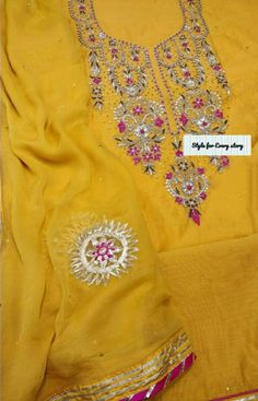 Item Overview ATHARVA Hand Embroidered Salwar Kameez w/Beautiful Neck Embroidery in Yellow/Banarsi Silk Dupatta Pink/Bridal Trousseau/Custom Stitch.CH1429 Fabric: * Shirt Chanderi/Yellow/ 2.5 Mts, with Beautiful Neck Embroidery * Dupatta:Chiffon Chinnon Dupatta: Gota Patti work (Motifs may wary) * Bottom Yellow Santoon Silk Silk Salwar.5 Mts. Excusive Hand Embroidered Party Wear Punjabi Suit. Customization: * Fabrics: Designs Can be made in different Fabrics. * Stitching Available Care: * Dry Cl Elegant Yellow Kurta With Mirror Work, Elegant Yellow Churidar With Gota Work, Yellow Organza Sets With Mirror Work, Yellow Chinon Kurta With Mirror Work, Elegant Yellow Salwar Kameez With Mirror Work, Yellow Organza Kurta With Zari Work, Unstitched Georgette Sharara With Gota Work, Yellow Elegant Georgette Churidar, Elegant Yellow Georgette Churidar