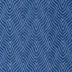 a blue fabric with wavy lines on the back and sides, as well as an image of