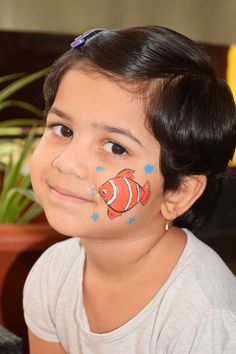 Nemo Face Paint, Animal Face Paint Ideas For Kids, Face Paint Animals, Easy Face Painting Ideas For Kids Simple, Easy Face Painting Ideas For Kids Simple Cheek Art, Fish Face Painting, Face Painting Animals, Easy Animal Face Paint, Simple Face Painting Ideas For Kids