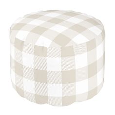 a white and beige checkered poufce