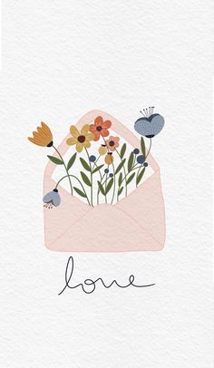 an envelope with flowers in it that says love