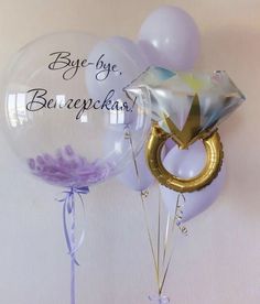 some balloons that say bye - bye, bereaepah and gold ring on them