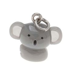 a gray and white koala charm with a silver ring on it's end