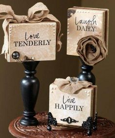 there are two decorative items on top of the table, one has a name tag that says love tenderly