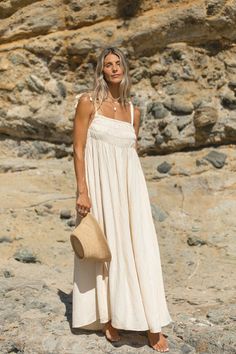 The Poppy Woven Cotton Gauze Maxi Dress features lightweight, 100% cotton construction that is perfect for a day in the sun. The full length design includes adjustable ties for a customized and comfortable fit. Enjoy a relaxed and effortless look with this breezy maxi dress. Chic Cotton Maxi Dress For Beach Cover-up, Cotton Midi Sundress For Vacation, Summer Cotton Midi Dress For Beach Cover-up, Summer Linen Maxi Dress For Daywear, Summer Floral Maxi Dress For Daywear, Summer Cotton Midi Dress For Vacation, Summer Maxi Dress For Daywear, Breezy Relaxed Fit Maxi Dress For Daywear, Summer Style Cotton Midi Dress For Vacation