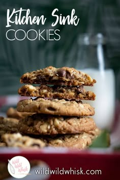 cookies stacked on top of each other in front of a glass of milk with the words, kitchen sink cookies