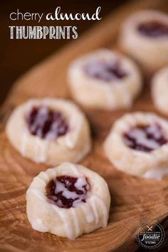 cherry almond thumbprints on a wooden cutting board