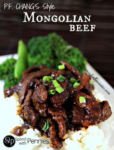 beef and broccoli on top of rice with gravy in the background