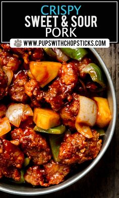 a bowl filled with meat and veggies on top of a wooden table text reads crispy sweet & sour pork