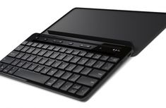 an image of a tablet with a keyboard attached to the back cover that is black