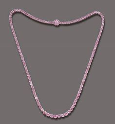 A RARE COLORED DIAMOND LINE NECKLACE Price realised USD 130,700 Estimate USD 100,000 - USD 120,000 Closed:  14 Oct 2003 Colorful Diamond Necklace, Formal Pink Diamond Necklace, Elegant Pink Diamond Necklace With Accents, Luxury Pink Necklaces With Diamond Accents, Pink Diamond Necklace Aesthetic, Luxury Pink Necklace With Brilliant Cut, Shiny Jewelry, Silver Diamond Necklace