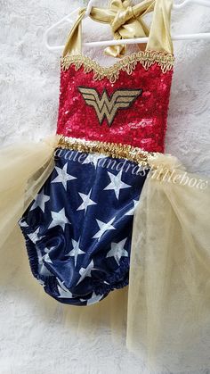 Wonder Woman Tutu Romper Everything in our Shop is Handmade in the USA with quality materials. Our Rompers Fit true to size, with room for growth, waist is stretchy and most straps are adjustable. We have a size chart for guidance of you have any questions don't hesitate to contact us. Customs welcomed. Mostly everything in our Shop can be customized in any size and color scheme. Care instructions, Handwash cold water, hand dry or lay flat to dry. *kids sizes are made into shorts instead of bloo Wonder Woman Tutu, First Birthday Outfits, Birthday Outfit, First Birthday, Color Scheme, Lay Flat, Cold Water, Care Instructions, Wonder Woman