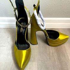 Originally Purchased From Fashion Nova. Never Worn Before. Only Tried On One Shoe. Other Shoe Still Has Packaging Wrap Around The Ankle Strap. Elegant Yellow Platform Heels, Yellow Ankle-high Heels For Party, Yellow Heels With Reinforced Heel For Party, Yellow Heels With 4-inch Heel For Night Out, Yellow Party Heels With Reinforced Heel, Gold High Heels, Fashion Nova Shoes, Olive Green Shorts, Classy Dress