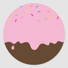 a pink frosted donut with sprinkles on it