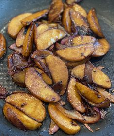 some food is being cooked in a frying pan