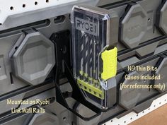 the inside of a computer case with yellow and black tags on it's sides