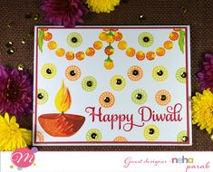 a happy diwali card with flowers and confetti