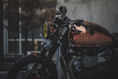 a motorcycle parked in front of a building