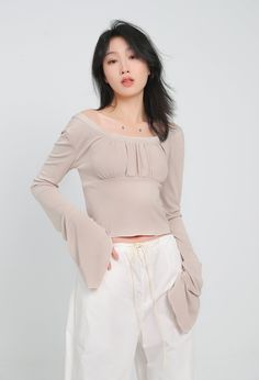 With all the comfort of a casual tee and the style of a dressy top, this crop top is a must-have for your wardrobe. A lightweight and airy fabric makes this crop top a perfect choice for a hot day or a night out on the town. The ruched front detail adds a touch of glamour, while the flare sleeves keep things interesting.
Gender: WomenMaterial: PolyesterClothing Length: ShortSleeve Length: Long SleeveSleeve Type: Angel Sleeve Chic Cropped Long Sleeve Stretch Top, Solid Cropped Long Sleeve Top For Spring, Chic Stretch Cropped Long Sleeve Top, Cropped Long Sleeve Top For Spring, Chic Flowy Summer Crop Top, Chic Flowy Crop Top For Summer, Casual Summer Blouse For Night Out, Summer Chic Flowy Crop Top, Stretch Slightly Cropped Summer Crop Top