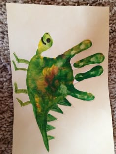 the handprint dinosaur - love the color mixture by kerose on instagram