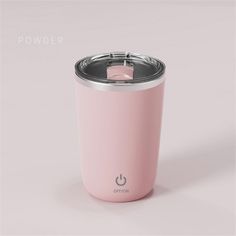 a pink cup with a metal lid is shown