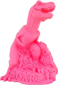 a pink dinosaur statue with the word roar on it's back and an image of a