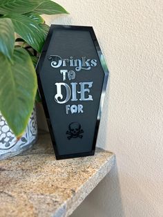 Elevate your Halloween festivities with our bewitching Halloween Drinks Bar Cart Sign, expertly crafted in the unique shape of a coffin. This one-of-a-kind piece is perfect for adding a touch of spooky chic to your home bar or party setup. 🎃D E T A I L S : - Choose from the small (7in x 12in) or large (8.75in x 15in) - Wood is painted with either matte black or matte white  - These boards are layered and made of 1/4" baltic birchwood and 1/8" colored acrylic (top layer border, lettering, and skull). Message me BEFORE PURCHASING if you want custom writing or different color lettering! Thank you! Rainbow colors: green, pink, blue, yellow, hot pink, orange. PLEASE NOTE: Each sign is made out of raw birchwood will has natural variations such as, knots, wood grain, color and texture.  All comp Coffin Sign Halloween, Halloween Bar Decorations, Halloween Bar Decor, Coffin Sign, Beetlejuice Party, Coffin Decor, Spooky Signs, Spooky Chic