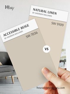 The image shows a side-by-side comparison of two Sherwin Williams paint samples. On the left is "Accessible Beige" with the code SW 7036, a warm and soft beige with subtle gray undertones, and on the right is "Natural Linen" with the code SW 9109, a lighter, creamier beige with a more pronounced yellow undertone. The two samples are positioned with a "VS" symbol between them, inviting a comparison of these warm neutrals. Natural Linen Sherwin Williams Walls, Accessible Beige Sw, Accessible Beige Sherwin Williams, Sherwin Williams Paint Neutral, Warm Neutral Paint Colors, Beige Paint Colors, Yellow Paint Colors, Beige Room, Accessible Beige