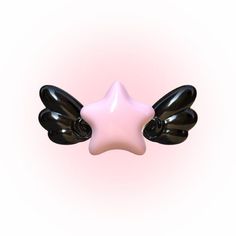 an inflatable star with black wings on a light pink and black balloon background