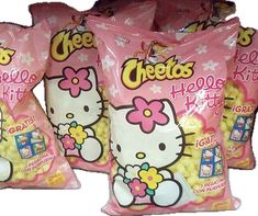 three bags of hello kitty snacks sitting on top of each other