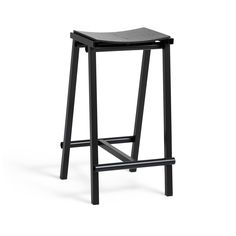 a black stool on a white background with the seat upholstered to it's back