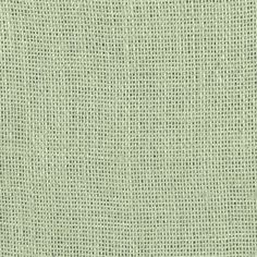 a light green fabric textured with small squares