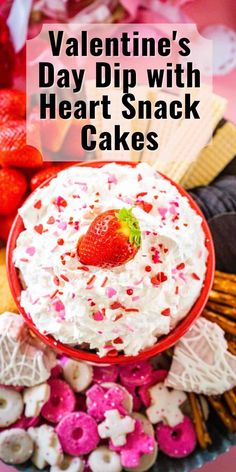 valentine's day dip with heart - shaped snack cakes on a platter for dessert