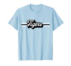 PRICES MAY VARY. Support your sports team with this vintage-inspired Tiger mascot t-shirt. Great shirt for all sports teams, Football, Baseball, Soccer, Basketball, Track, Softball, Swim Team, Cheerleading, Marching Band. High School mascot, college, school spirit Great gift for birthdays or Christmas for a Tigers sports fan in high school, middle school, elementary school or college! Retro Shirt, Graphic Tee, Black and White Stripe, Team colors available, Mens, Womens, Kids, Youth, Mom, Dad, Li Band High School, High School Mascots, Tiger Mascot, School Elementary, School Middle School, Tiger Shirt, College Kids, College School, Swim Team