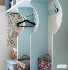 a closet with clothes hanging on the shelves