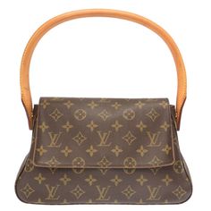 AUTHENTIC LOUIS VUITTON M51147 Monogram Mini Looping Hand Bag 0347 Description Store Item No. 3J0347PB5 Brand LOUIS VUITTON Type Mini Looping/Monogram Model No. M51147 Code MI0041 Country of Manufacture France Production year 2001 Size(CM) W28cm x H16cm x D9cm Handle:52cm Size(Inch) W11.0 x H6.3 x D3.5inch Handle:20.5inch Color Brown Metal Colur Gold Material MonogramCanvasxMonogramCanvas Style Hand Bag come with None Spec [Inside] Zipper pocket x 1 Condition Total ABrank There are Stain / Scrap 70s Fashion Pictures, Monogram Models, Sell Items, Women's Bags, Luxury Items, Hand Bag, Authentic Louis Vuitton, Monogram Canvas, Gold Material