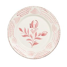 a pink and white plate with flowers on it's rim, against a white background