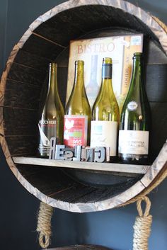 several bottles of wine are sitting on a shelf