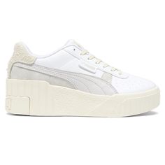 Higher and hotter than ever. Meet the Cali Wedge: a bold update to the Cali silhouette with an extreme, wedge sole. This sneaker's colorway mixes white and off-white tone for a unique look, while premium leather materials on its upper give the style a true "Thrifted" vibe. $69.95 Puma Cali Wedge, Womens Puma, Puma Cali, White Tone, Lace Up Sneakers, White Shop, Leather Material, Casual Sneakers, Cali